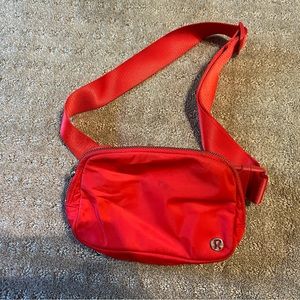 Red lululemon belt bag